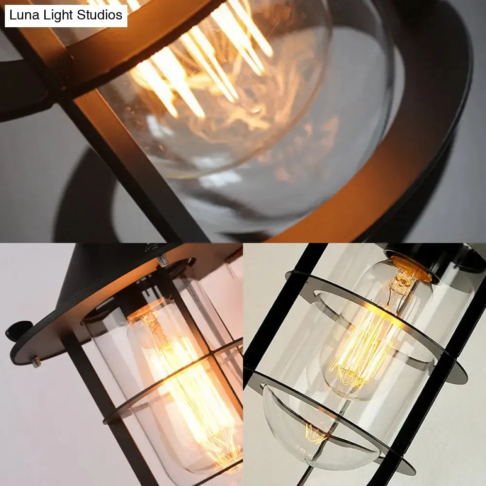 Black Sconce Lamp: Clear Glass Capsule, 1-Light Traditional Wall Mount with Cage